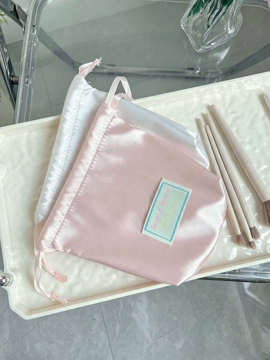 1pc/10pcs Soft Minimalist Satin Drawstring Storage Bag, Vertical Pouch Shape, With Label Patch And Ribbon Closure, Portable Makeup Organizer, Suitable For Daily Storage, Business Trip, Travel, Vacation And Indoor Daily Use