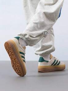 Adidas Originals 女款經典低筒運動鞋 GAZELLE BOLD W 輕量舒適透氣休閒運動鞋 ID7056 - 乳白/深綠/棕褐色 - 查看 5