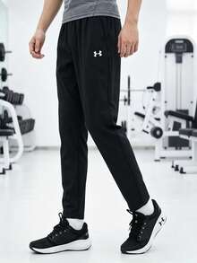 Under Armour Men's Vanish Training Pants, Minimalist Comfortable Lightweight Everyday Wear, 6010606-001 - Black - View 1