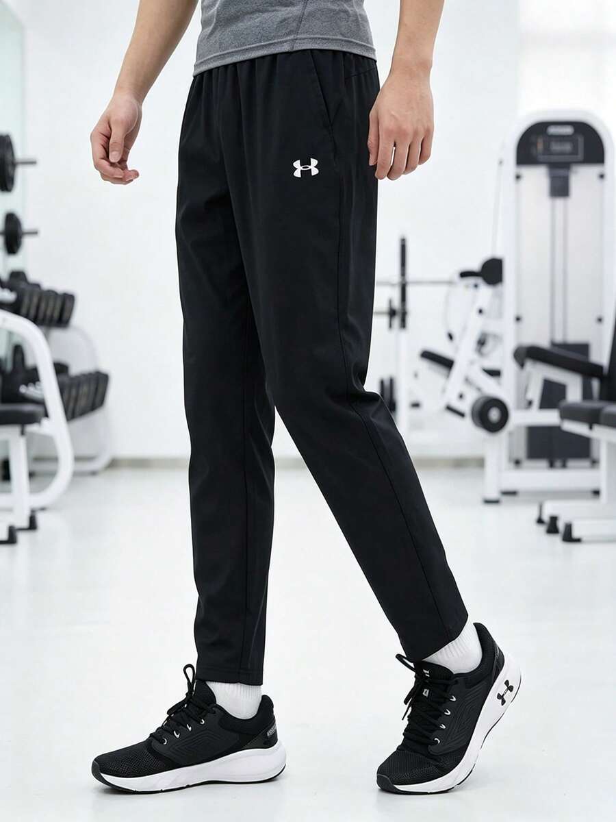 Under Armour Men's Vanish Training Pants, Minimalist Comfortable Lightweight Everyday Wear, 6010606-001 - Black - View 1