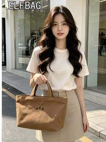 休閒極簡字母帆布托特包 素色女款時尚手提包 高 CP 值百搭包款 適合媽媽、學生、上班族，適用外出、購物與街拍 - 咖啡棕 - 查看 7