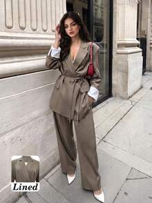 Bộ blazer tay dài phối thắt lưng, túi, ve áo hai hàng cúc, lót tương phản màu trơn và quần ống rộng thời trang công sở thu đông cho nữ - Màu Khaki - Xem 1