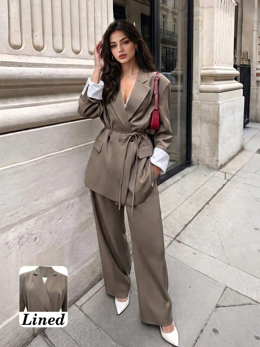 Bộ blazer tay dài phối thắt lưng, túi, ve áo hai hàng cúc, lót tương phản màu trơn và quần ống rộng thời trang công sở thu đông cho nữ - Màu Khaki - Xem 1