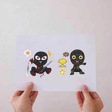 1 مجموعة/16 قطعة مجموعة ملصقات شخصيات بأسلوب الأبطال DIY، ملصقات أحجية متعددة التصاميم مختلطة، مجموعة عرض ديكور العطلات على المكتب، دعائم متعددة الأغراض لألعاب الحفلات وكشك الصور، مثالية لاحتفالات أعياد الميلاد والتجمعات العائلية والفعاليات الاجتماعية وحفلات العطلات وحفلات الأبطال وتنسيق المشاهد والحفلات الداخلية ومناسبات الاحتفالات المختلفة - متعدد الألوان - مشاهدة 4