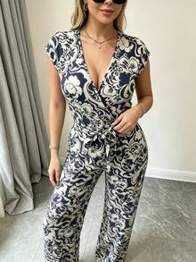 Jumpsuit de estampado vintage con cuello en V y cintura ajustada con cordón, corte wide leg fluido y favorecedor, perfecto para looks de verano y ocasiones especiales - azul real - Ver 1