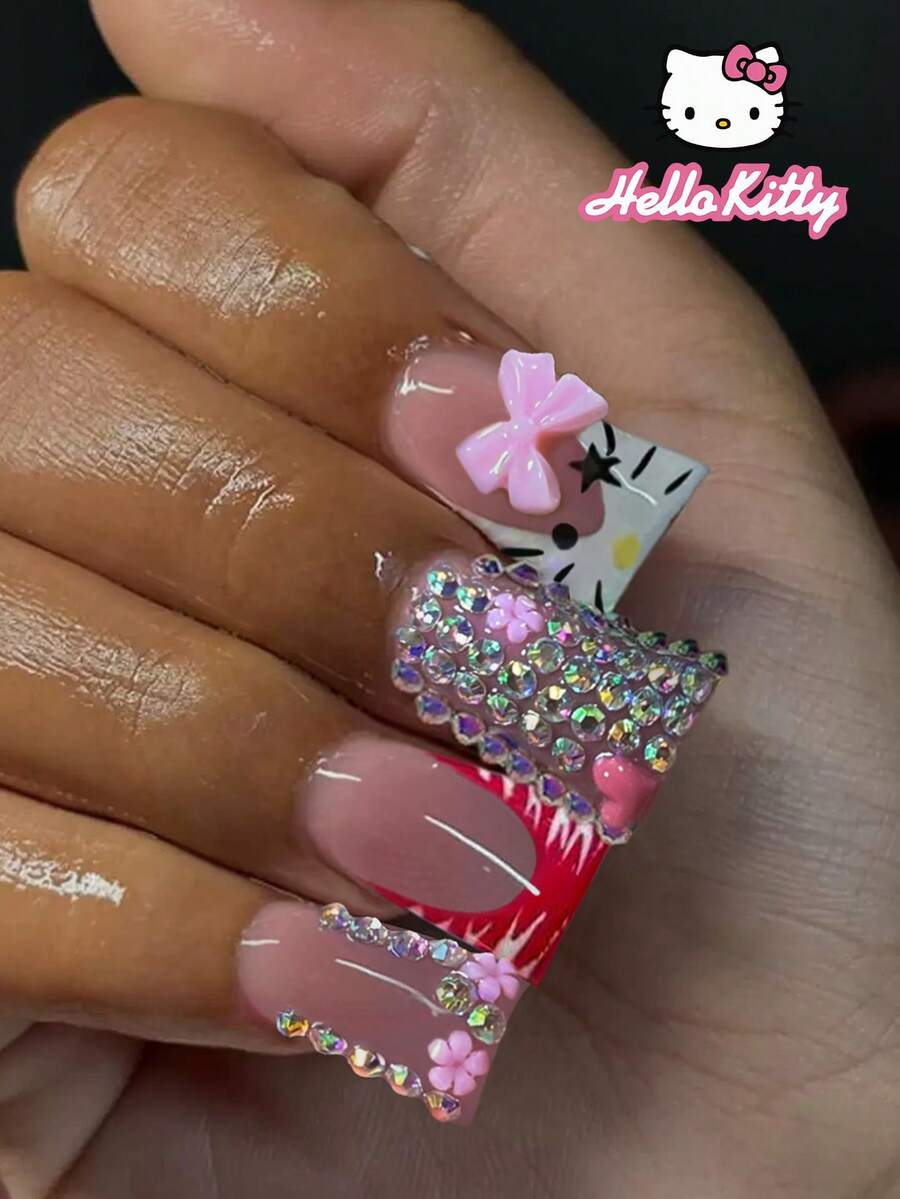 Sanrio Hello Kitty 24片中號鴨豹紋與紅色法式穿戴甲,附可愛3D Hello Kitty、愛心、水鑽與花朵設計,貼合假指甲套組,含1片果凍膠與1片指甲锉,適合女性與女孩日常與派對使用 - 彩色 - 查看 1