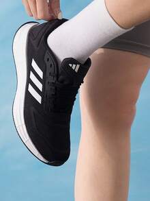 Adidas Sepatu Lari Wanita Kasual Sporty Ringan dan Nyaman ADIZERO ADIOS PRO Terbaru - Hitam dan Putih - View 1
