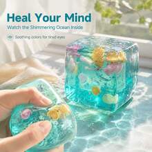 Q-Lia Ocean Theme Squeeze Cube, Ultra-Soft Transparent Stress Relief Toy With Built-In Shells And Fish, Crystal Clear Texture Fidget Toy, Soothing Sensory Toy For Adults And Children - Multicolor - View 3