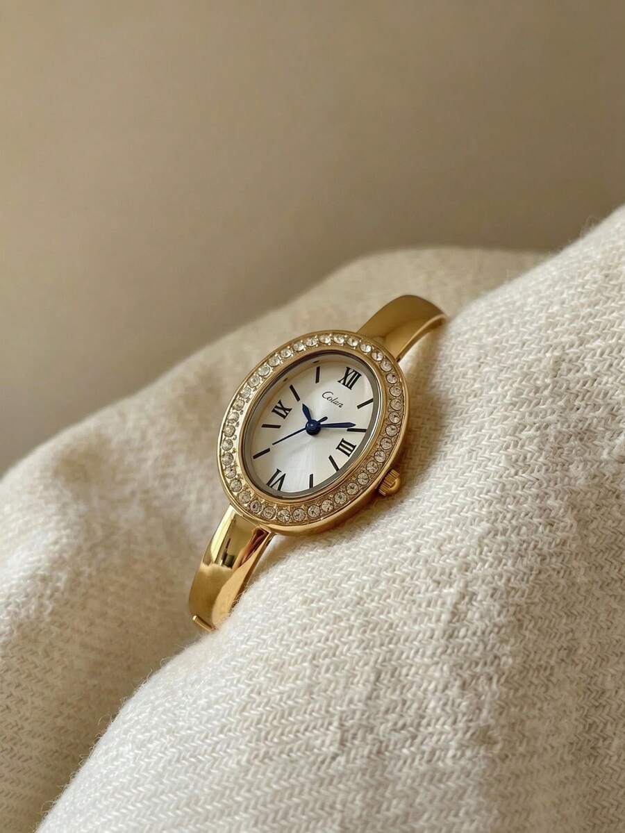 1件女款奢華金手鍊腕錶,精緻橢圓羅馬數字小錶盤,錶圈鑲嵌閃亮水鑽,一體式拋光金色手鍊設計,復古法式小眾奢華石英錶,可搭配多種溫柔風格穿搭,適合作為畢業禮物、週年禮物、節日驚喜,精緻耐用的女性珠寶飾品,送給女孩子的絕佳選擇 - 金色 - 查看 1