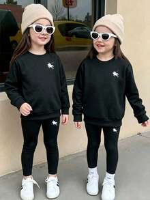 Bộ áo tay dài cổ tròn in hoạt hình và quần legging cho bé gái - màu đen - Xem 1