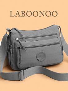 Bolso de hombro de nailon casual con correa ajustable, multicompartimento, unicolor, cierre con cremallera, forro de poliéster, bolso cruzado ligero y conveniente para uso diario - Gris - Ver 1
