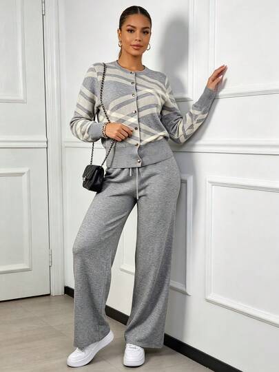 Conjunto mujer 2 piezas: suéter manga larga y pantalones largos, diseño moderno, tejido suave abrigado para otoño‑invierno, look elegante y acogedor.