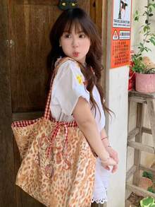 日韓風 INS 花卉豹紋女款單肩包，大容量帆布托特手提包，適合通勤、外出、日常購物，小眾設計腋下肩背包 - 橘色 - 查看 2