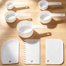 8pcs White Measuring Cups + White Scraper, Multi-Functional Baking Auxiliary Tools, White Plastic Hanging Measuring Spoon Flat Scraper, Serrated Shape Scraper, Curved Dough Cutter, Flour, Nuts, Milk Powder, Powdered Sugar Quantitative Measuring Cup, Cake Frosting Spatula, Dough Divider Scraper, Essential Baking Kitchen Tool Set - View 5