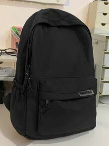Mochila unicolor resistente al agua para hombre, diseño versátil en color negro.Amplia capacidad como mochila universitaria y bolsa escolar, ideal para escuela, viajes y playa. - Negro - Ver 1