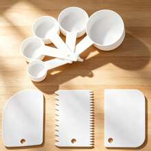 8pcs White Measuring Cups + White Scraper, Multi-Functional Baking Auxiliary Tools, White Plastic Hanging Measuring Spoon Flat Scraper, Serrated Shape Scraper, Curved Dough Cutter, Flour, Nuts, Milk Powder, Powdered Sugar Quantitative Measuring Cup, Cake Frosting Spatula, Dough Divider Scraper, Essential Baking Kitchen Tool Set - View 1