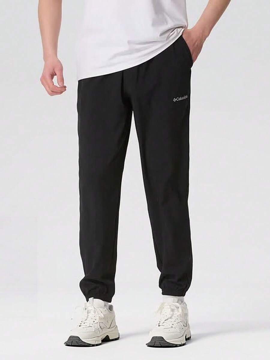 Columbia Men's Outdoor Comfortable Breathable Minimalist Tapered Leg Casual Woven Long Pants - Black - View 1