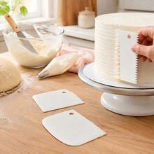 8pcs White Measuring Cups + White Scraper, Multi-Functional Baking Auxiliary Tools, White Plastic Hanging Measuring Spoon Flat Scraper, Serrated Shape Scraper, Curved Dough Cutter, Flour, Nuts, Milk Powder, Powdered Sugar Quantitative Measuring Cup, Cake Frosting Spatula, Dough Divider Scraper, Essential Baking Kitchen Tool Set - View 3