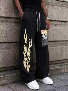 MAISONFOX Men's Black Loose Sweatpants, Vintage Cream Flame Pattern & Patchwork Text, Drawstring Wide Leg Joggers, Retro Skateboard Streetwear Long Pants - Black - View 9