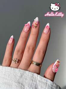 Sanrio Hello Kitty 24片杏白色法式指尖穿戴甲，附可愛3D Hello Kitty、蝴蝶結與星星裝飾設計，完美貼合壓克力假指甲套組，含1個果凍膠與1個指甲锉，適合女性女孩日常、派對與聚會使用 - 彩色 - 查看 1
