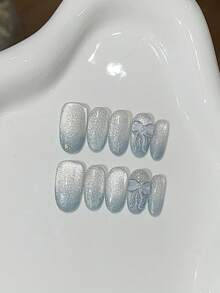 10片短橢圓手工穿戴甲，藍色清新霧感漸層亮面貓眼美甲，附精緻蝴蝶結，適合女孩與女性，適用假日派對與日常配戴 - 淺藍色 - 查看 4