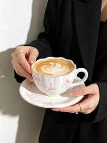 1pc French Girl Style Pink Bow Ceramic Coffee Cup And Saucer Set, Delicate High-Temperature White Porcelain Material, Wavy Rim, Pink Edge Trim, Hand-Painted Soft Pink Bow Print, Rounded Comfortable Handle; Suitable For Latte, Fruit Tea, Milk, Home Afternoon Tea, Office Drinking, Cafe Display, Girly Desktop Decor, Exquisite Holiday Gift And Other Various Occasions - Multicolor - View 7