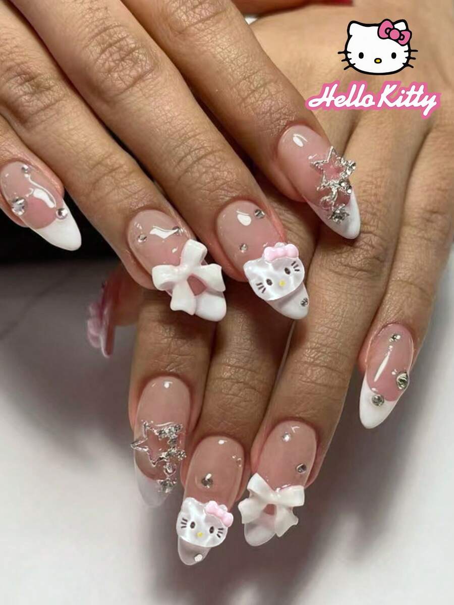 Sanrio Hello Kitty 24片長杏仁形法式穿戴甲,附可愛3D Hello Kitty裝飾、蝴蝶結合金、星星、水鑽與領結,適合壓克力假指甲套組,含果凍膠與指甲锉,適合女性與女孩日常及派對使用 - 彩色 - 查看 1