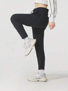 Under Armour Pantalones deportivos casuales ligeros de exterior de punto de felpa otomana para mujer 1379778-001 - negro - Ver 1