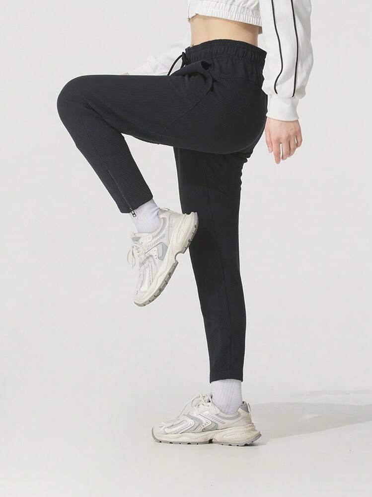 Under Armour 女款 Ottoman 抓絨針織運動休閒輕量戶外長褲 1379778-001 - 黑色 - 查看 1