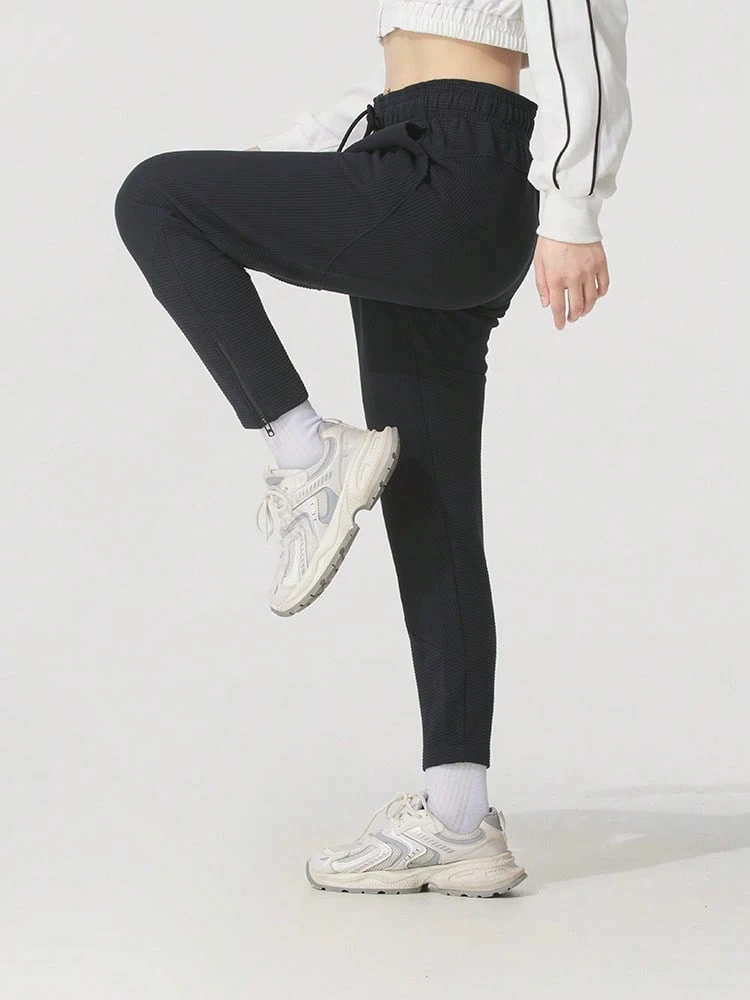 Under Armour Pantalones deportivos casuales ligeros de exterior de punto de felpa otomana para mujer 1379778-001 - negro - Ver 1
