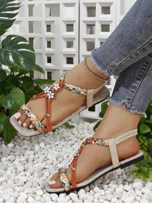 Damen Sommer Mode Boho Flache Sandalen, gewebtes Hohldesign mit Blumen- und Metallelement, geeignet für Strand, Urlaub, Dates und verschiedene Anlässe, Orange - Orange - Übersicht 3