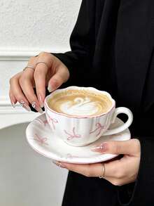 1pc French Girl Style Pink Bow Ceramic Coffee Cup And Saucer Set, Delicate High-Temperature White Porcelain Material, Wavy Rim, Pink Edge Trim, Hand-Painted Soft Pink Bow Print, Rounded Comfortable Handle; Suitable For Latte, Fruit Tea, Milk, Home Afternoon Tea, Office Drinking, Cafe Display, Girly Desktop Decor, Exquisite Holiday Gift And Other Various Occasions - Multicolor - View 1