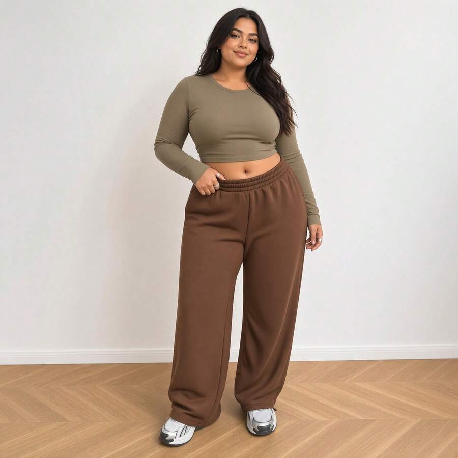 Calça de moletom plus size marrom de malha com cordão, pernas largas e modelagem elástica, ideal para o outono. Perfeita para relaxar em casa. - Marrom - Visão 1