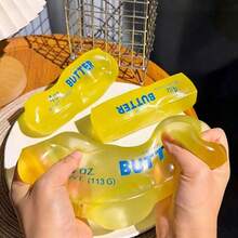 Crystal Gloss Yellow Stretchy Butter Toy 1pc, Soft TPR Anti‑Anxiety Squeeze Fidget, Desktop Decor Ornament, Halloween Easter Party Bag Fillers - Multicolor - View 1