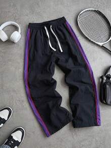 Men's Nylon Ice Silk Quick Dry Pants, Side Contrast Stripe, Elastic Waist Cuffed Hem, Casual Sports Long Pants - Black - View 1