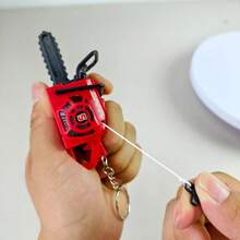 Mini Chainsaw Keychain, Novelty Pull-Cord Stress Relief Gadget, 3D Chainsaw-Shaped Bag Pendant, Durable Plastic Key Ring Accessory, Portable Desktop Decoration, Creative Pocket Collectible Gift, Suitable For Gifting To Friends And Daily Use - Multicolor - View 2