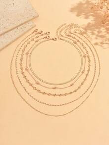 5件組休閒風多層疊戴金色項鍊套組，附三葉草吊墜與扁平蛇骨鏈，女款日常穿戴、度假、派對與約會項飾，鏈長可分段剪裁，環數可調 - 金色 - 查看 2