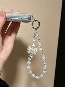 1 Stück eleganter Handgelenkriemen für Handy mit Kunstperlen, süßer Schleifen-Kristallanhänger, kurze Anti-Drop-Handkette als Handy-Charm, Accessoire für Handyhülle, Tasche & Kamera - Verschiedenfarbig - Übersicht 4