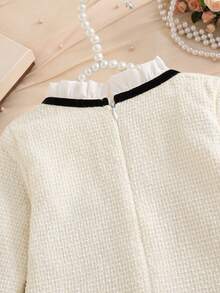 Girls French Style Tweed Dress, Cream Textured Tweed Fabric, Ruffle Collar With Black Satin Bow, Contrast Black Trim Cuffs, Double Pockets With Exquisite Pearl Chain Embellishment, Loose A-Line Silhouette - Apricot - View 6