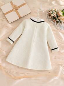 Girls French Style Tweed Dress, Cream Textured Tweed Fabric, Ruffle Collar With Black Satin Bow, Contrast Black Trim Cuffs, Double Pockets With Exquisite Pearl Chain Embellishment, Loose A-Line Silhouette - Apricot - View 4