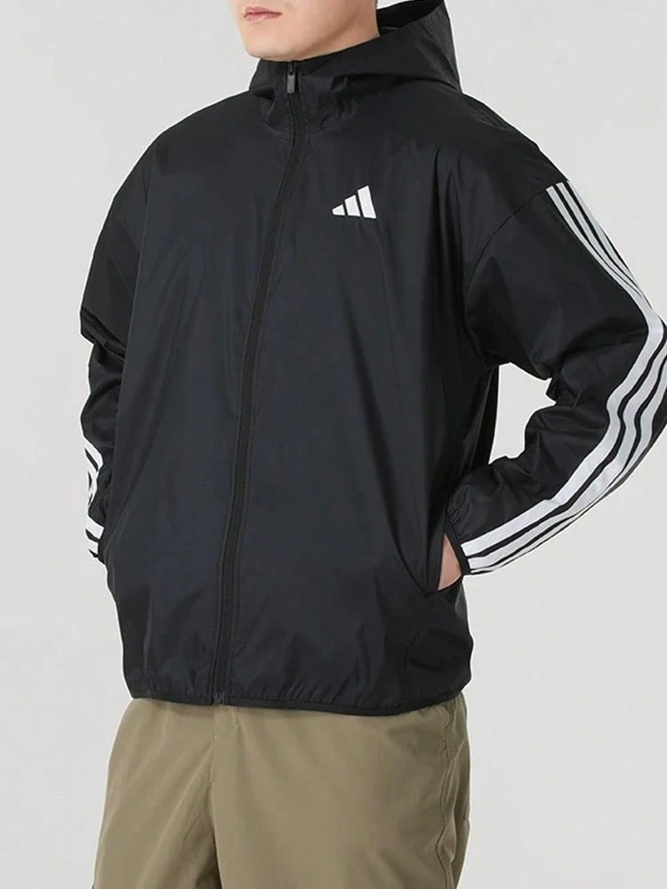 Jaket adidas Essential 3-Stripes Ripstop Windbreaker Series Sport Striped Hooded Zip-Up Waterproof Windproof Long-Sleeve Jacket for Men - Hitam - View 1