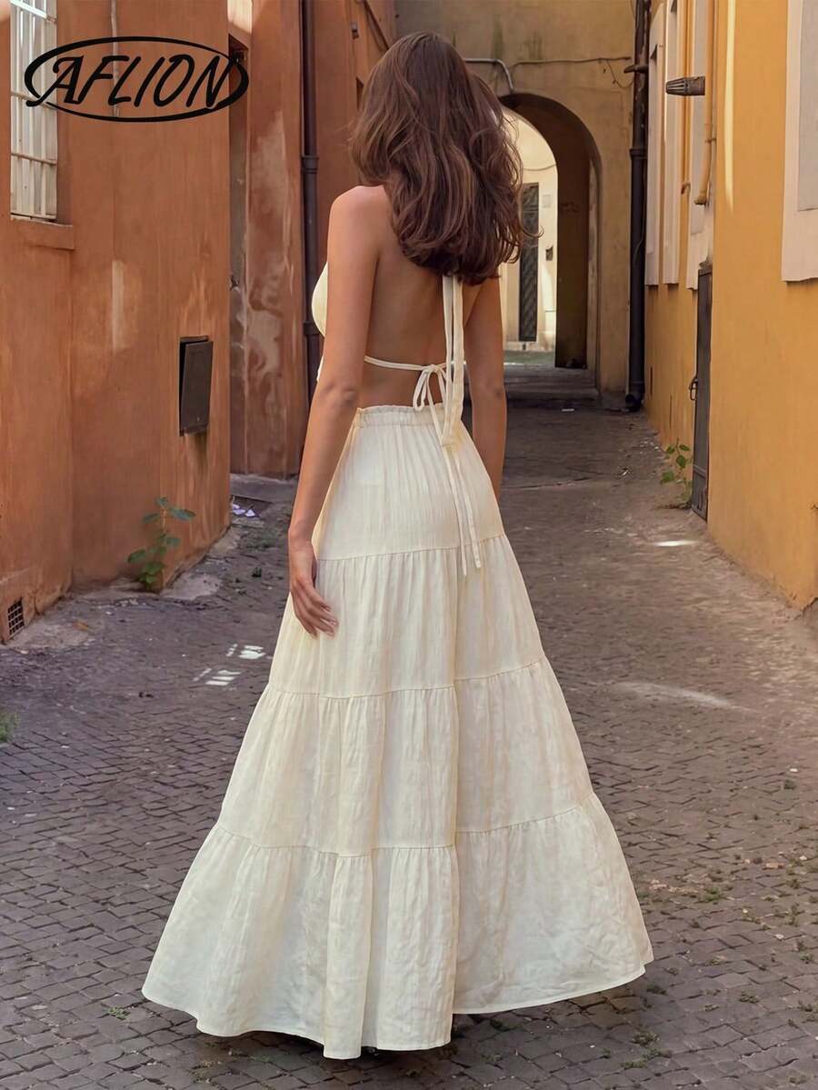 Aflion Women's Halter Backless Two Pieces Skirt Set, Ruffle Crop Top Tiered Maxi Skirt, Light Skin-Friendly Unidirectional Elastic Fabric - Apricot - View 1