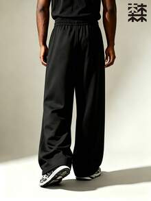 mulinsen Men's Comfortable Skin-Friendly Breathable Drape Casual Pants, Loose Fit Versatile, Pleated Design Elastic Waist Pants - Black - View 4