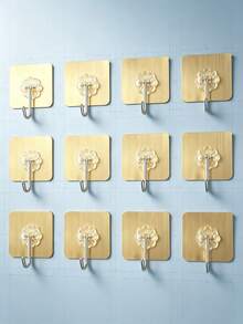 Stylish Wall Hooks, Easy To Stick On, No Drilling Required. They Are Securely Installed And Suitable For Use In Kitchens And Bathrooms, Offering Multiple Uses Such As Serving As Practical Hangers And Multi-Functional Hooks. - View 1
