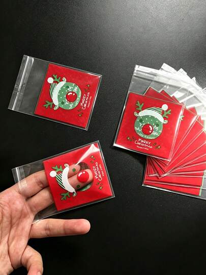 100 piezas Bolsas de regalo de plástico transparente, bolsas de embalaje navideñas autosellantes, envoltorio de regalos festivos para tarjetas de Navidad, dulces, joyería pequeña, para quienes dan regalos, suministros para fiestas navideñas, bolsas de golosinas reutilizables de OPP autoadhesivas