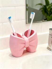 1pc Cute Bow-Shaped Storage Rack, Dual-Compartment Storage Cup, Multi-Functional Bathroom Toothbrush & Toothpaste Holder, Vanity Makeup Brush Holder, Bedroom & Kitchen Countertop Decorative Desktop Pen Holder Storage Box - 1pc Pink - View 9