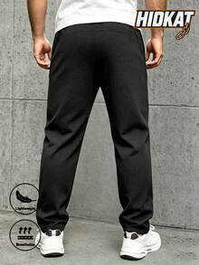 Hidkat Men's Textured Athletic Long Pants, Solid Color, Minimalist, Lightweight, Elastic Waist With Drawstring, Casual Streetwear, Daily Sports, Spring/Autumn - Black - View 2