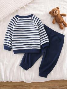 2-delat set för babypojke i blått och vitt med ribbad raglan-sweatshirt med björnpatch och långärmar, samt långbyxor med ribbade muddar, enkel avslappnad ribbstickad vardagsoutfit för barn till vår/höst - Multifärgad - Visa 2