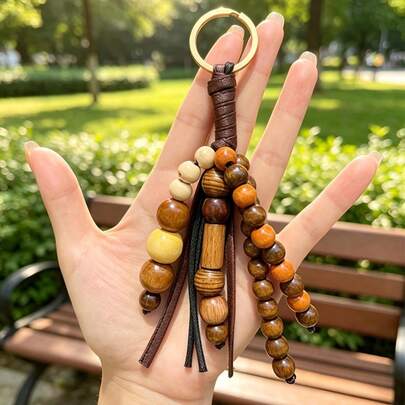 JRESSIAL Mignon et polyvalent, porte-clés de mode décontractée multicolore avec fleurs, perles et pendentif à franges, accessoire de sac DIY personnalisable, cadeau exclusif pour anniversaire et anniversaire