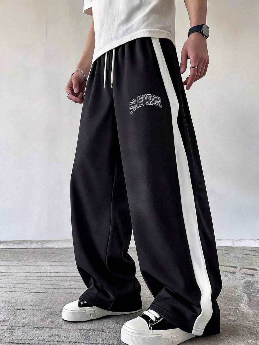 1pc Men's Minimalist College Style Creative Typography Print Straight Leg Loose Casual Sports Long Pants - Black - View 1